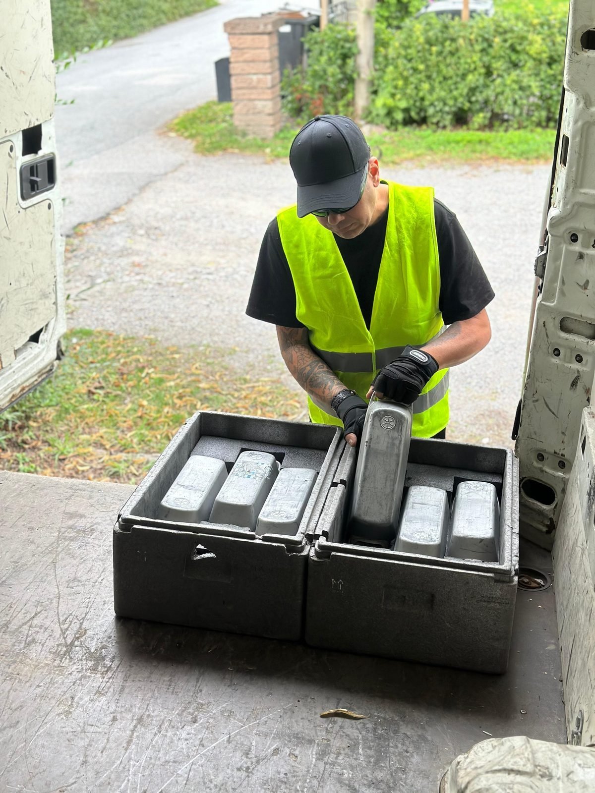 Binny crew with thermal battery case — every battery logged, swap-in and swap-out SoC captured